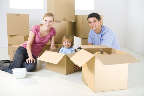 Office removals planning in Archway with moving boxes and business furniture