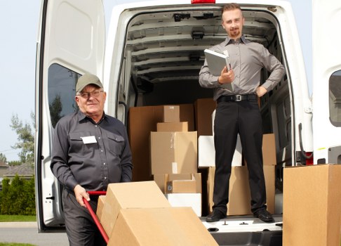Removal van and moving boxes for a house move in Archway