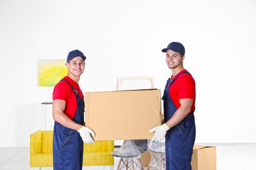 Local office movers handling equipment in North London