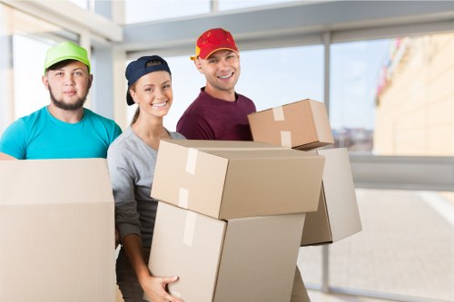 Commercial moving team preparing office items for relocation in Archway