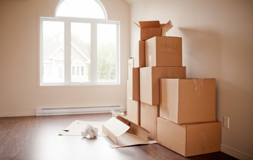 Removal team handling house moving in Archway with boxes and furniture